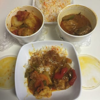 Indopak World Market - Mixed vegetables on the left,  Chicken Karahai Curry on the right and pilao rice - Halal Near Me - Arlington, Texas