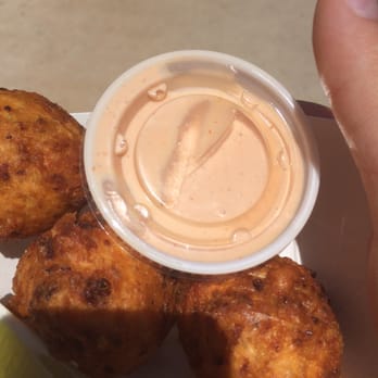 The Conch Shack - Conch fritters with spicy sauce - Seafood Near Me - Key West, Florida The Conch Shack - Conch fritters with spicy sauce - Seafood Near Me - Key West, Florida