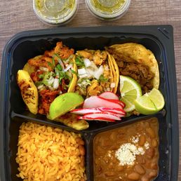 Chicken, Asada, Pollo Taco Plate. Rice & beans. Plated with limes, radishes and plenty of sauce.