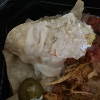 El Pollo Loco - This is the nachos with the sauce all over it so you don't know the nachos are still - Mexican Near Me - San Jacinto, California El Pollo Loco - This is the nachos with the sauce all over it so you don't know the nachos are still - Mexican Near Me - San Jacinto, California