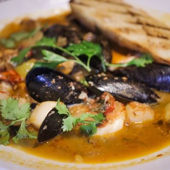 Chart House - a bowl of seafood stew with bread - Seafood Near Me - Melbourne, Florida