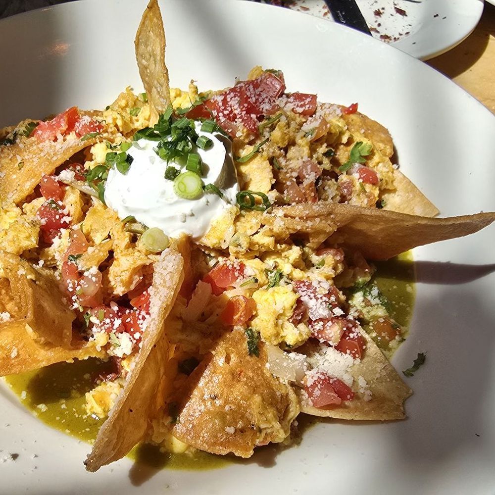 The Cheesecake Factory - Green Chilaquiles with Carnitas and Eggs - American Near Me - Cherry Hill, New Jersey The Cheesecake Factory - Green Chilaquiles with Carnitas and Eggs - American Near Me - Cherry Hill, New Jersey