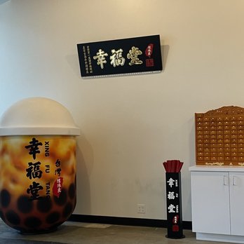 Xing Fu Tang - Inside display. Giant Bubble Tea statue (left) and a fortune display (right). - Bubble Tea Near Me - Seattle, Washington Xing Fu Tang - Inside display. Giant Bubble Tea statue (left) and a fortune display (right). - Bubble Tea Near Me - Seattle, Washington