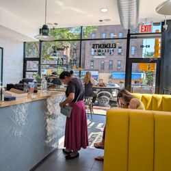 Elements Pizzeria - Inside. Clean, well lit, lovely yellow booths