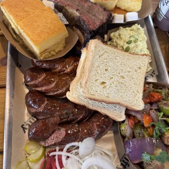 2Fifty Texas BBQ - Dino rib, smoked spicy sausage, smoked sausage, potato salad, roasted veggies. - Barbeque Near Me - Riverdale Park, Maryland