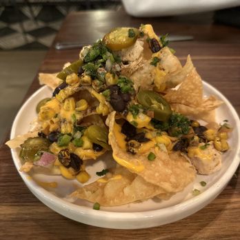 The Chicken Koop - 5/5: Loaded nachos served on a warm bed of fried wontons! Yumm!! - Chicken Shop Near Me - Downey, California The Chicken Koop - 5/5: Loaded nachos served on a warm bed of fried wontons! Yumm!! - Chicken Shop Near Me - Downey, California