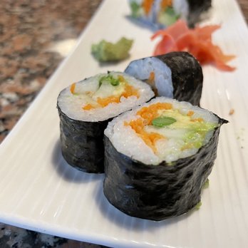 Thai Cafe - three sushi rolls on a white plate - Thai Near Me - Miami Lakes, Florida