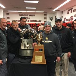 David Ness, DC - Dr. Ness with the team's orthopedic surgeons and the Commander in chief's trophy.