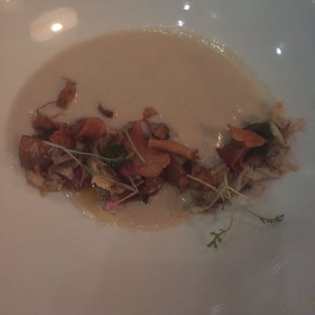 Juniper - Sunchoke a dish with blue crab, Meyer lemon sauce and arugula - Italian Near Me - Austin, Texas