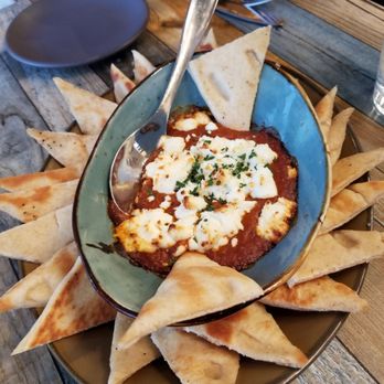 Sixty Six Acres - Goat cheese with spicy harrissa and toasted pita pieces - Cocktail Bars Near Me - Albuquerque, New Mexico