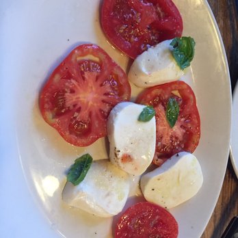 Pizzeria Libretto Danforth - This is the caprese salad I got. Supposed to be heirloom tomatoes. No. - Pizza Near Me - Toronto, Ontario Pizzeria Libretto Danforth - This is the caprese salad I got. Supposed to be heirloom tomatoes. No. - Pizza Near Me - Toronto, Ontario