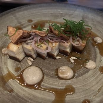Uchi Denver - Tofu with fried sunchokes and black fermented honey. Portions are smaller than they appear. - Japanese Near Me - Denver, Colorado Uchi Denver - Tofu with fried sunchokes and black fermented honey. Portions are smaller than they appear. - Japanese Near Me - Denver, Colorado