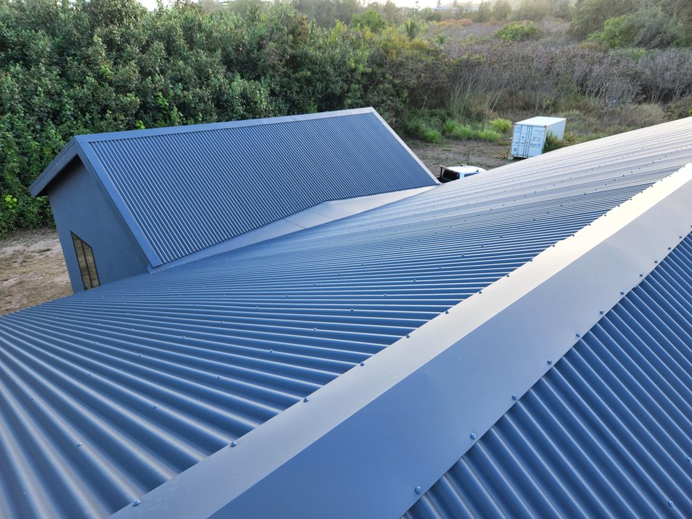 Slide of Metal Roof Pros-Kaua'i Roof Installers
