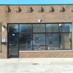 Holly Jene Designs - We are located next door to Luigi's