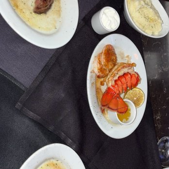 Ruth's Chris Steak House - Filet with shrimp and lobster spilt on two plates. - Steakhouses Near Me - Minneapolis, Minnesota Ruth's Chris Steak House - Filet with shrimp and lobster spilt on two plates. - Steakhouses Near Me - Minneapolis, Minnesota