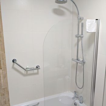 Clontarf Castle Hotel - Shower with waterfall/rain head and smaller wand - Hotels Near Me - Dublin, D Clontarf Castle Hotel - Shower with waterfall/rain head and smaller wand - Hotels Near Me - Dublin, D