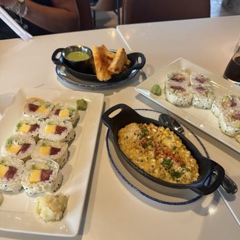 Briza Restaurant - L to R- tuna mango roll, yuca Frita, street corn and thai tuna roll - Sushi Bars Near Me - Memphis, Tennessee Briza Restaurant - L to R- tuna mango roll, yuca Frita, street corn and thai tuna roll - Sushi Bars Near Me - Memphis, Tennessee