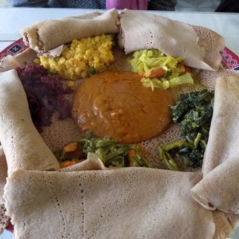 Awash Ethiopian Restaurant - Vegetarian for two with generous injera covering some of the food. You will leave satisfied! - Ethiopian Near Me - Nashville, Tennessee Awash Ethiopian Restaurant - Vegetarian for two with generous injera covering some of the food. You will leave satisfied! - Ethiopian Near Me - Nashville, Tennessee