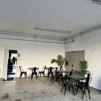 Dos Cuervos cafe - Little outdoor patio in the back by the parking lot - Coffee & Tea Near Me - Los Angeles, California Dos Cuervos cafe - Little outdoor patio in the back by the parking lot - Coffee & Tea Near Me - Los Angeles, California