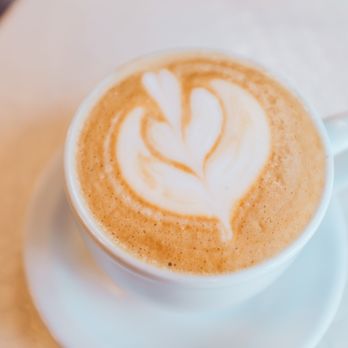 Damask Rose Coffee - a cup of coffee on a saucer - Coffee & Tea Near Me - Oakland, California