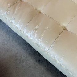 Quickcleanup Full Service Cleaning - Closeup of damage on sofa after last cleaning