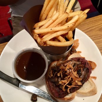 Colors Bistro - a burger and french fries on a plate - American Near Me - Calgary, Alberta Colors Bistro - a burger and french fries on a plate - American Near Me - Calgary, Alberta