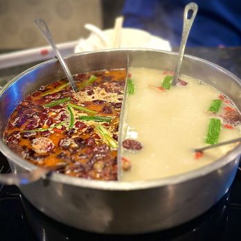 Happy Lamb Hot Pot - a close up of a pot of soup - Mongolian Near Me - Mountain View, California Happy Lamb Hot Pot - a close up of a pot of soup - Mongolian Near Me - Mountain View, California