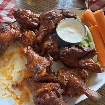 Bully Ranch Restaurant - Chicken wings appetizer with house-made buffalo sauce - American Near Me - Vail, Colorado Bully Ranch Restaurant - Chicken wings appetizer with house-made buffalo sauce - American Near Me - Vail, Colorado