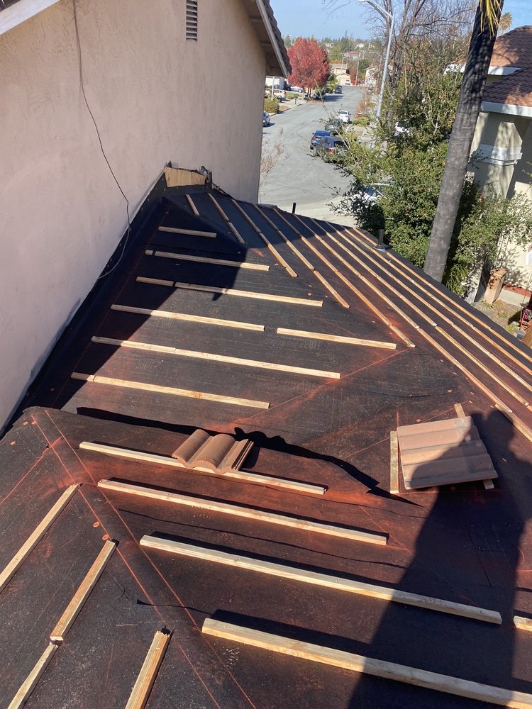 Slide of Rendon roofing