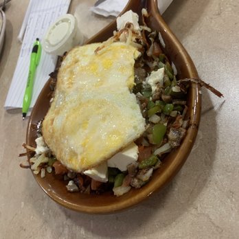 Apple Tree Family Restaurant - Grecian skillet ( with a couple of bites missing!). Two eggs over hard, hashbrowns, gyro meat, onions,gr peppers, tomatoes,feta cheese. - American Near Me - Columbus, Wisconsin