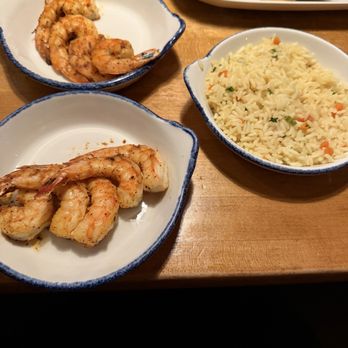 Landry's Seafood House - Grilled shrimp skewer and rice pilaf - Seafood Near Me - St. Louis, Missouri Landry's Seafood House - Grilled shrimp skewer and rice pilaf - Seafood Near Me - St. Louis, Missouri