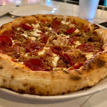 Pupatella - Caivano which is sausage, pepperoni, bacon, and smoked mozzarella - Pizza Near Me - Arlington, Virginia