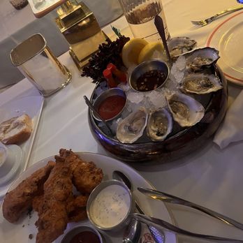 Delilah - Delilah's Famous Chicken Tenders with spicy bbq sauce and buttermilk ranch, and Half Dozen West Coast Oysters - New American Near Me - Las Vegas, Nevada