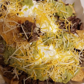 Enrique's Mexican Restaurant - Ask for a asada nacho plate. Pretty good with sour cream and guacamole and cheese.. - Mexican Near Me - Long Beach, California Enrique's Mexican Restaurant - Ask for a asada nacho plate. Pretty good with sour cream and guacamole and cheese.. - Mexican Near Me - Long Beach, California