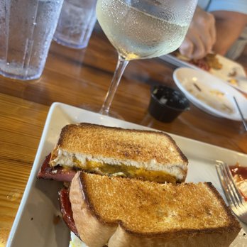 Between the Antlers - The Country Store Sandwich and Prosecco. Uncommon but good combo. - Seafood Near Me - Georgetown, South Carolina Between the Antlers - The Country Store Sandwich and Prosecco. Uncommon but good combo. - Seafood Near Me - Georgetown, South Carolina