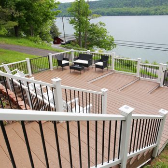 Yerdon Construction - Front deck with stair providing waterfront view. - General Contractors Near Me Yerdon Construction - Front deck with stair providing waterfront view. - General Contractors Near Me