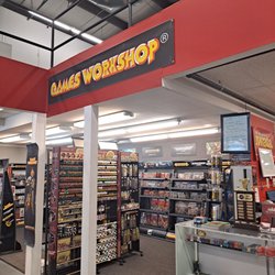 The Art Store / Commercial Art Supply - They sell Games Workshop, role playing books/models, and some board games at The Art Store in addition to their regular art supplies.