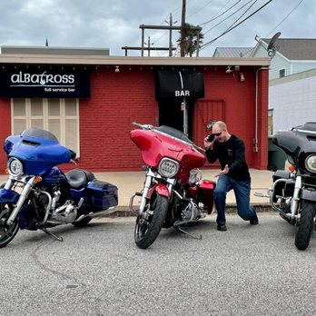 The Albatross - a man sitting on a motorcycle - Dive Bars Near Me - Galveston, Texas The Albatross - a man sitting on a motorcycle - Dive Bars Near Me - Galveston, Texas