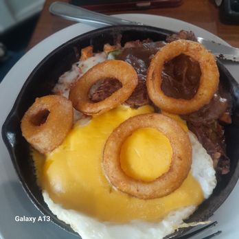Hash Kitchen - She loved it!!! The brisket, onion rings cornbread w/ hollidaise sauce skillet - Breakfast & Brunch Near Me - Scottsdale, Arizona Hash Kitchen - She loved it!!! The brisket, onion rings cornbread w/ hollidaise sauce skillet - Breakfast & Brunch Near Me - Scottsdale, Arizona
