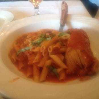 Emilia's Restaurant - Penne pasta with stuffed pork loin. - Italian Near Me - Bronx, New York Emilia's Restaurant - Penne pasta with stuffed pork loin. - Italian Near Me - Bronx, New York