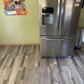 Schuster Roofing & Renovations - a stainless steel refrigerator in a kitchen - Roofing Near Me - Milwaukee, Wisconsin Schuster Roofing & Renovations - a stainless steel refrigerator in a kitchen - Roofing Near Me - Milwaukee, Wisconsin