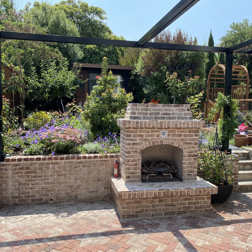 JML Landscapes - After: brick patio with fireplace, cottage style garden - Landscaping Near Me - San Francisco, California JML Landscapes - After: brick patio with fireplace, cottage style garden - Landscaping Near Me - San Francisco, California
