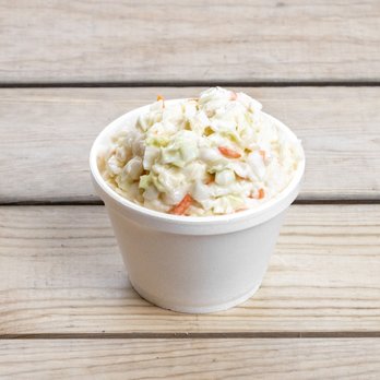Chicken Express - a bowl of coleslaw on a wooden table - Chicken Wings Near Me - Early, Texas