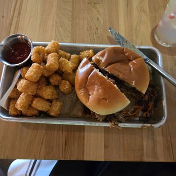 The Craftsman - Their shredded pork sandwich with tater tots. Delicious! - Cocktail Bars Near Me - Eagle River, Wisconsin