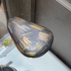 PNG Jewelers - Shaligram stone to test gold carats