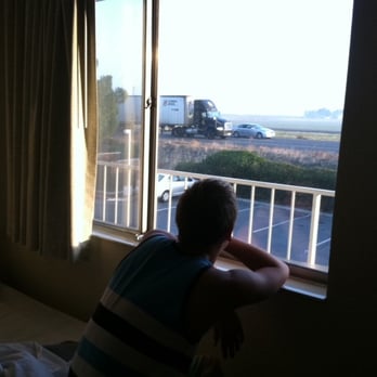 Motel 6 - The view from our room in the morning - it is really loud. And you can see the bed is up against the wall in double room. - Hotels Near Me - Gustine, California Motel 6 - The view from our room in the morning - it is really loud. And you can see the bed is up against the wall in double room. - Hotels Near Me - Gustine, California