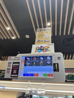 Kura Revolving Sushi Bar by null