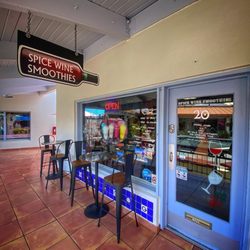 Spice Wine Smoothie - Front sign and entrance with outdoor seating