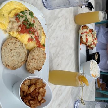 Another Broken Egg Cafe - Lobster brie omelet, home fries, mimosas - Breakfast & Brunch Near Me - Jacksonville, Florida Another Broken Egg Cafe - Lobster brie omelet, home fries, mimosas - Breakfast & Brunch Near Me - Jacksonville, Florida