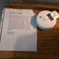 Economy Inn - Smoke detector not plugged in.